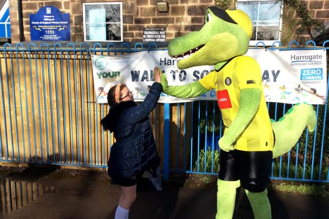 Children at Killinghall Primary School were joined by Harrogate Town AFC mascot Harry Gator for Walk to School Day