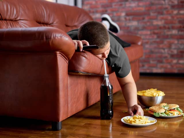 If you do indulge in binge watching television take care not to snack too much, because it is easy to develop a habit and unconsciously eat when you don’t need to. Photo: AdobeStock