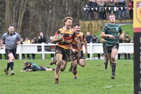 Kristan Dobson on his way across the try-line to register Harrogate RUFC's first score of the afternoon against York. Picture: Daniel Kerr