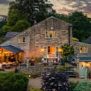 A rear view of the five bedroom village home, with its backdrop of Nidderdale countryside.