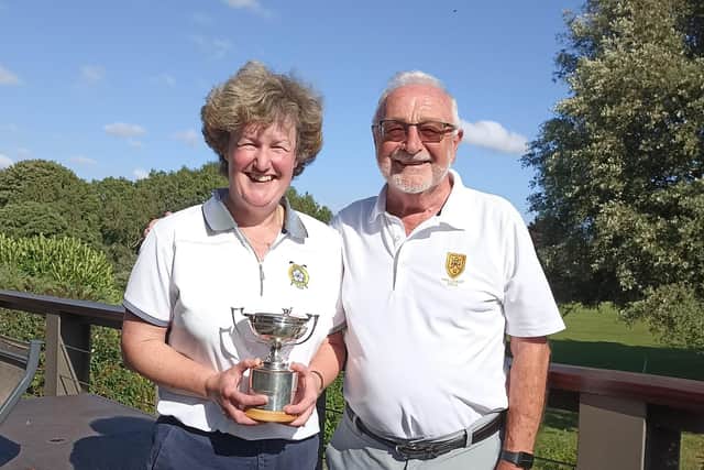 HDUGC's Silver Division Individual Champion Claire Hutchinson, of Pannal GC, with union president Bill Caw. Picture Submitted