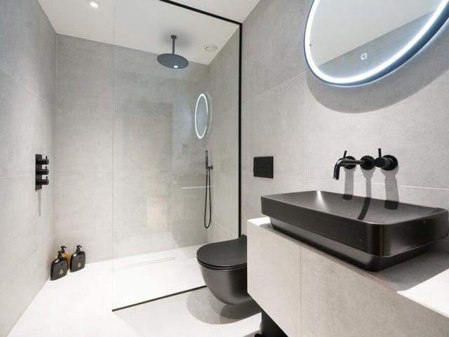 A contemporary shower room within the property.