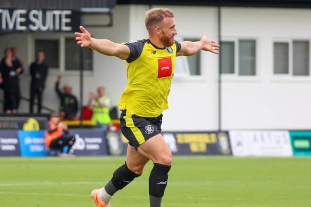 George Thomson celebrates after firing Harrogate Town into a two-goal lead against Morecambe. Pictures: Matt Kirkham