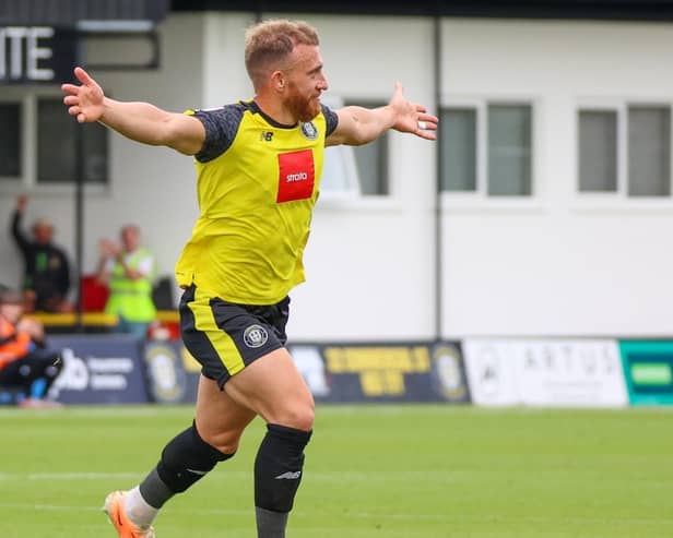 George Thomson celebrates after firing Harrogate Town into a two-goal lead against Morecambe. Pictures: Matt Kirkham