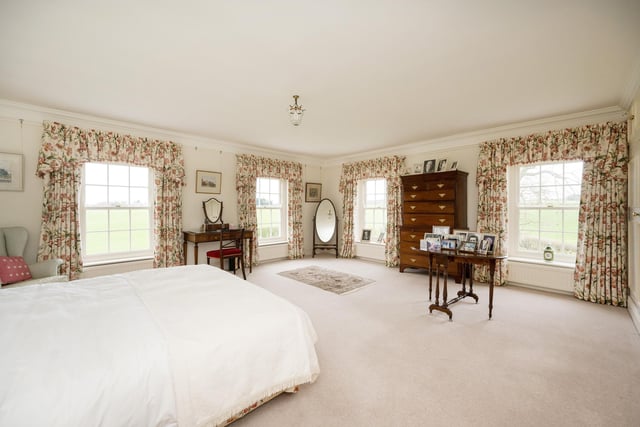 A stunning king-size and double aspect bedroom is bright and spacious.