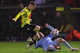 On-loan Huddersfield midfielder Matty Daly had to be substituted in the 51st minute of Harrogate Town's 3-0 win over Mansfield at Wetherby Road. Pictures: Matt Kirkham