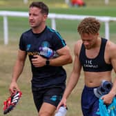 Harrogate Town Director of Youth Football Josh Falkingham, left, heads off the training field with Stephen Duke-McKenna following the conclusion of a pre-season fitness session. Picture: Matt Kirkham