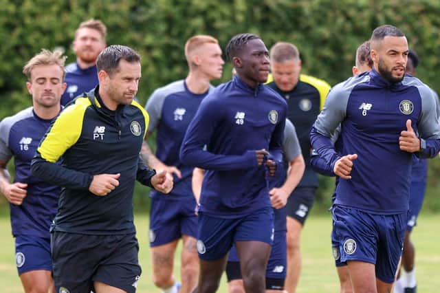 Members of Harrogate Town's first-team squad and staff pictured during a training session. Pictures: Matt Kirkham