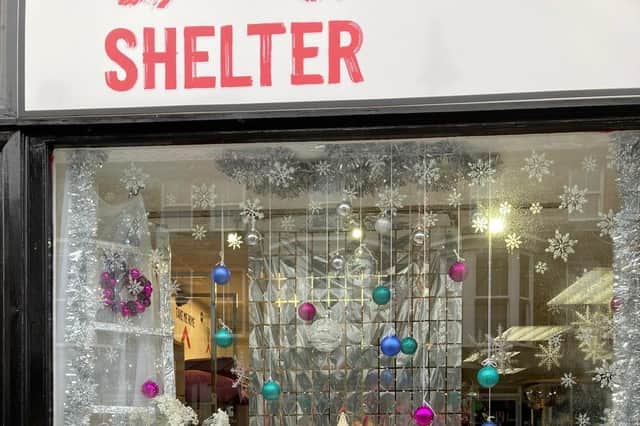 Charity Shop Christmas Window Competition Zone Winners for Harrogate Town - Gold Award: Shelter, Commercial Street.