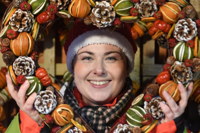 Sprinkle the Elf with one of the handmade wreaths for sale at the Christmas market on Cambridge Street