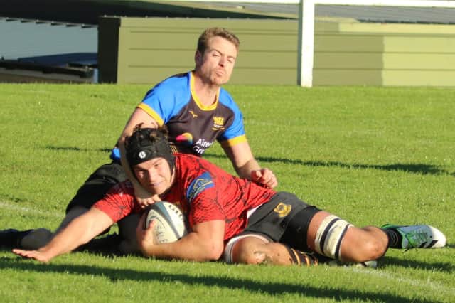 Hugh Tatlow dives over the try-line during Harrogate Pythons' Yorkshire One clash with Bradford Salem. Pictures: Submitted