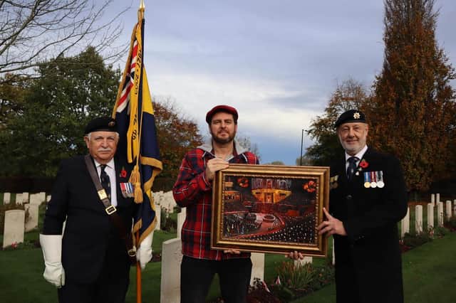 Paul Mirfin, centre, was commissioned by Knaresborough British Royal Legion to create a spectacular oil painting of the annual Remembrance day celebrations at the Royal Albert Hall in London.