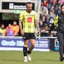 Alex Pattison leaves the pitch with Harrogate Town physio Rachel McGeachie during the first half of Saturday's 3-1 League Two defeat to Northampton at Sixfields. Pictures: Pete Norton/Getty Images