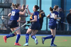 Charlotte Crossman, left, is congratulated after firing Harrogate Hockey Club Ladies 1st XI into the lead. Pictures: Gerard Binks