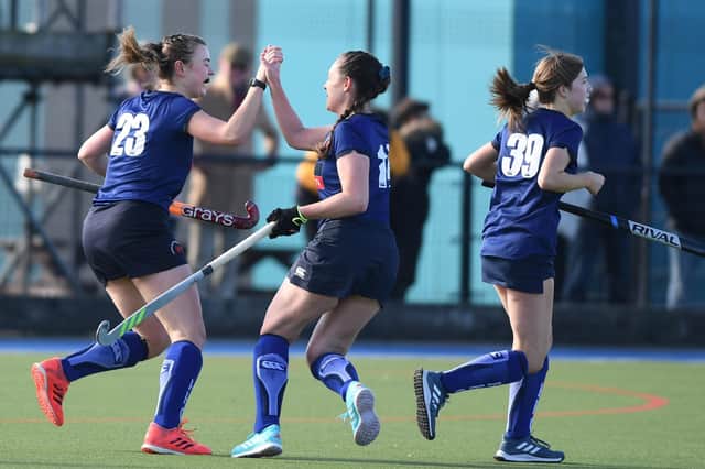 Charlotte Crossman, left, is congratulated after firing Harrogate Hockey Club Ladies 1st XI into the lead. Pictures: Gerard Binks
