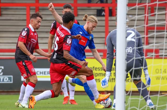 Luke Armstrong is crowded out by the home defence during Harrogate Town's 1-0 League Two defeat at Stevenage. Pictures: Matt Kirkham