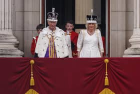 King Charles III and Queen Camilla on the Buckingham Palace balcony after the Coronation (Picture: Dan Kitwood/Getty Images)