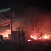 These pictures show firefighters tackling a fire that destroyed a barn and machinery in a Harrogate district village