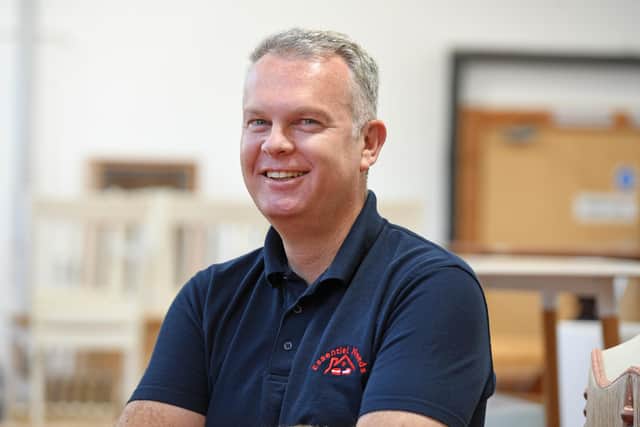 Lee runs the charity, which was set up to help people in furniture poverty, on a day-to-day basis. Photo: Gerard Binks