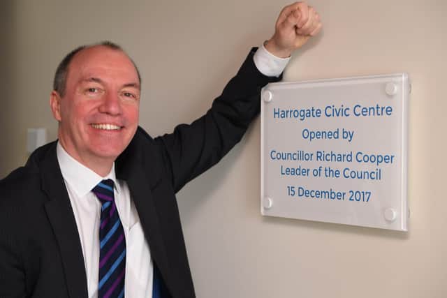 The departing leader of Harrogate Borough Council Councillor Richard Cooper with the plaque marking the opening of Harrogate Civic Centre,  the council's new headquarters in 2017 at Knapping Mount. (Picture Gerard Binks)