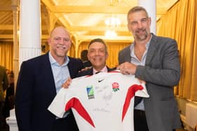 Former England internationals Mike Tindall, left, and Simon Shaw, right, with auction winner Ian Chimes at Harrogate Pythons RUFC's annual dinner. Pictures: Simon Godsave