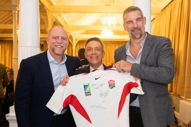 Former England internationals Mike Tindall, left, and Simon Shaw, right, with auction winner Ian Chimes at Harrogate Pythons RUFC's annual dinner. Pictures: Simon Godsave