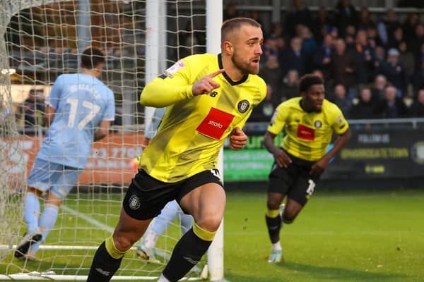 Alex Pattison celebrates after firing Harrogate Town into a fifth-minute lead against Mansfield Town. Pictures: Matt Kirkham