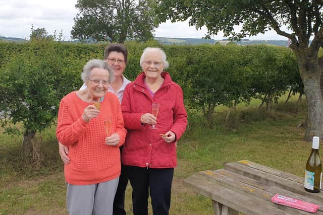 Residents Sheila Bowser and Sylvia Waterfield from HC-One’s St Peter’s Court Care Home at Roseberry Topping with Beverley Kitching, Wellbeing Coordinator
