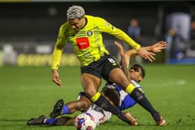 Harrogate Town forward Dior Angus in action against Colchester United. Pictures: Matt Kirkham