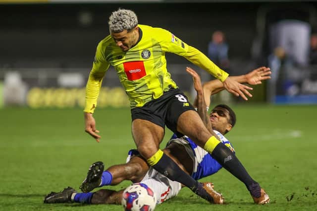 Harrogate Town forward Dior Angus in action against Colchester United. Pictures: Matt Kirkham