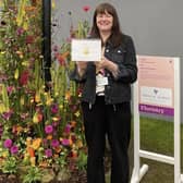Harrogate florist Helen James with her gold medal award winning floral display at the RHS Chelsea Flower Show