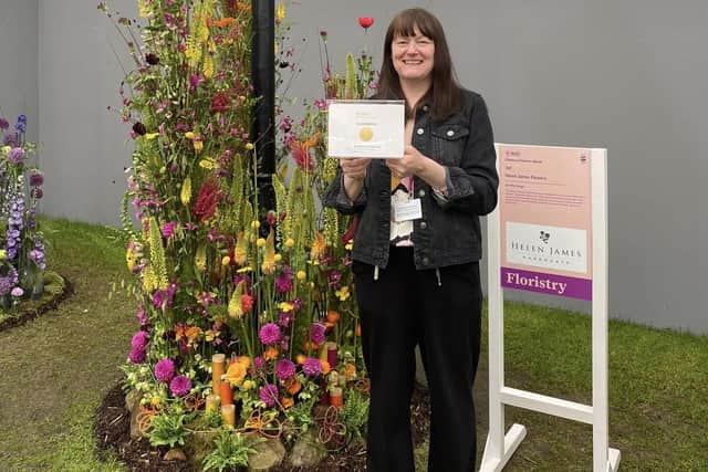 Harrogate florist Helen James with her gold medal award winning floral display at the RHS Chelsea Flower Show