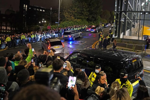 People watch the former US president Barack Obama leave the University of Strathclyde in Glasgow during the Cop26 summit.
