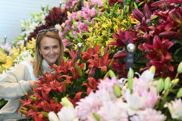 Gemma Miller of Harts Nursery amongst her Premier Gold award-winning lily display