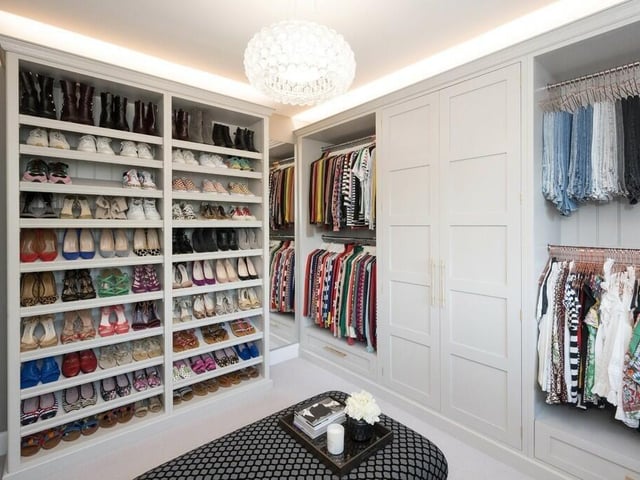 A dressing room with ample storage.
