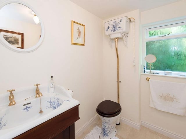 One of the property's bathrooms in keeping with period furnishings with a contemporary overall appeal.