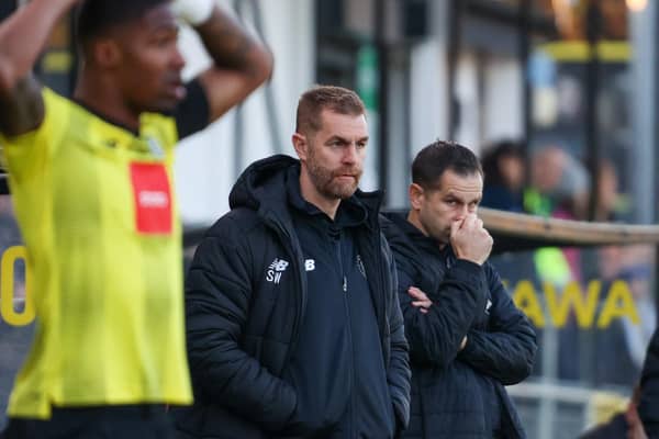 Harrogate Town manager Simon Weaver watches on from the sidelines at Wetherby Road.