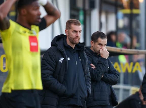 Harrogate Town manager Simon Weaver watches on from the sidelines at Wetherby Road.