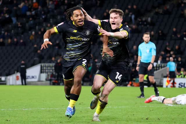 Zico Asare, left, and Toby Sims celebrate after the former netted a stunning 92nd-minute equaliser for Harrogate Town.