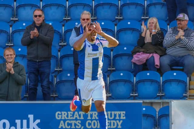 Kwesi Appiah celebrates after capitalising on some 'disgraceful' defending to fire Colchester United into an eighth-minute lead against Harrogate Town. Pictures: Matt Kirkham