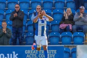 Kwesi Appiah celebrates after capitalising on some 'disgraceful' defending to fire Colchester United into an eighth-minute lead against Harrogate Town. Pictures: Matt Kirkham