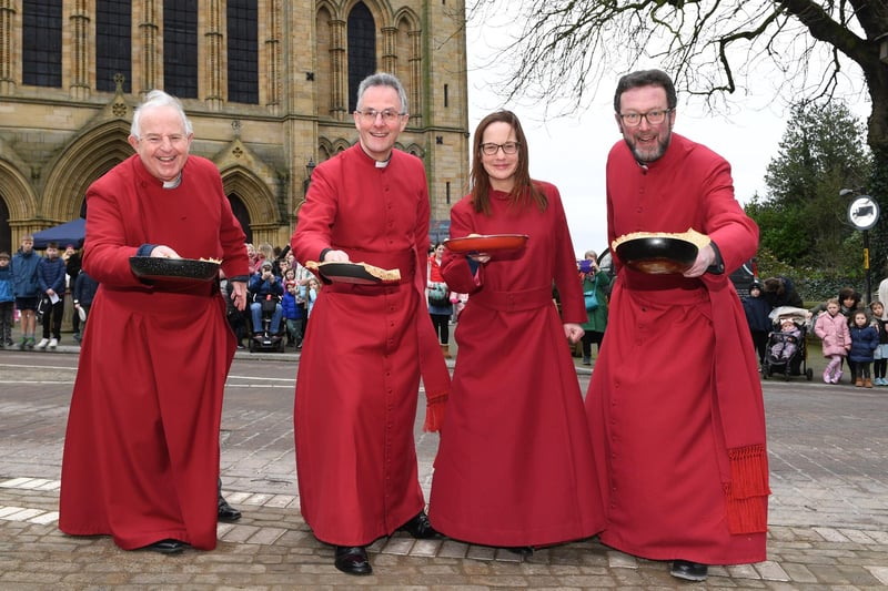 Pictured: The Favourable Clive Mansel, The Very Reverend John Dobson, Mrs Sarah Lynch and Canon Matthew Pollard, ready to flip pancakes in a race against each other.