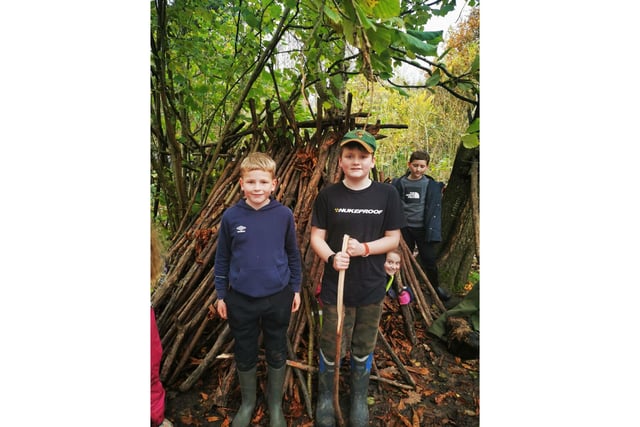 The boys were so proud of what they had built, and showed their strengths gathering materials from the woods.