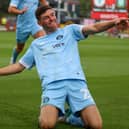 Ellis Taylor celebrates after firing Harrogate Town into a 2-1 lead against Accrington Stanley. Pictures: Matt Kirkham