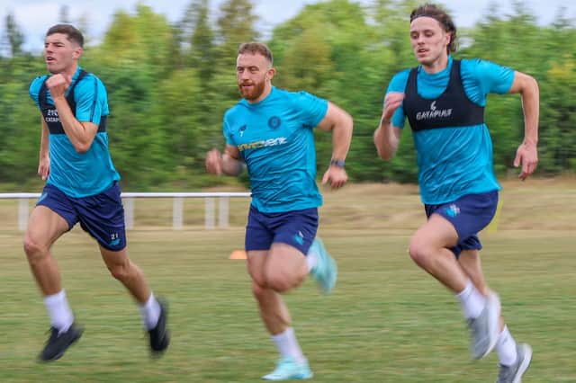 Harrogate Town's Ellis Taylor, George Thomson and Reece Smith put in the hard yards on day one of pre-season training. Picture: Matt Kirkham