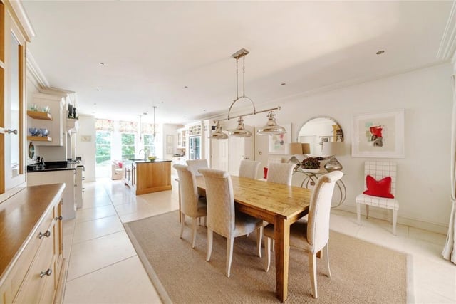 The dining room is open plan to the kitchen.
