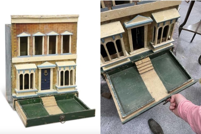 Pictured: A primitive 19th century dolls house suspected to be American. Opening bid at £120.