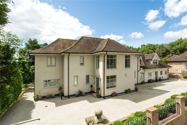 This five bedroom and three bathroom detached house is for sale with Savills for £1,495,000