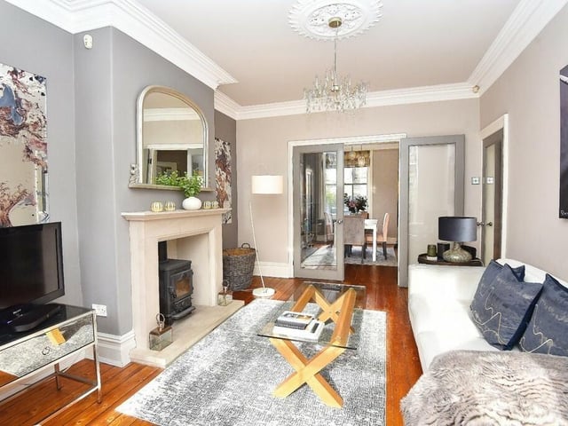 The sitting room has French doors through to the dining room.