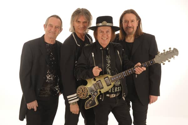 Slade today: Founder member Dave Hill on lead guitar, second from right, with John Berry on lead vocals, bass, acoustic guitar and violin; Russell Keefe on lead vocals and keyboards and new drummer Alex Bines.